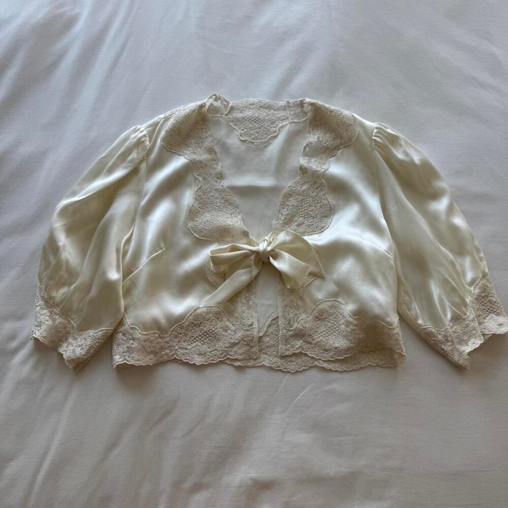 Cream silk lace blouse with bow detail